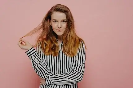 Woman with Balayage curly hair